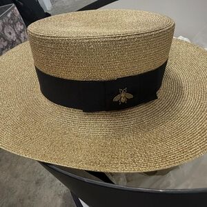 Gucci Gold Straw Hat with Black Band